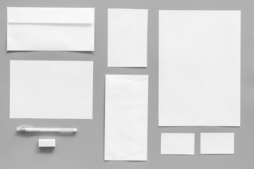 Mockup template for branding identity. White stationery on grey background top view. Pattern