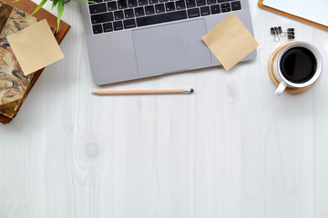 Office wooden desk laptop computer, office accessory and copy space.