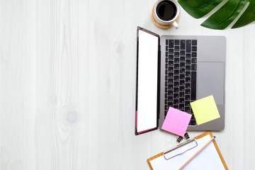Office wooden desk laptop computer, office accessory and copy space.