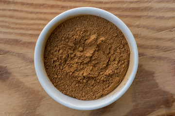 ground cinnamon in small bowl