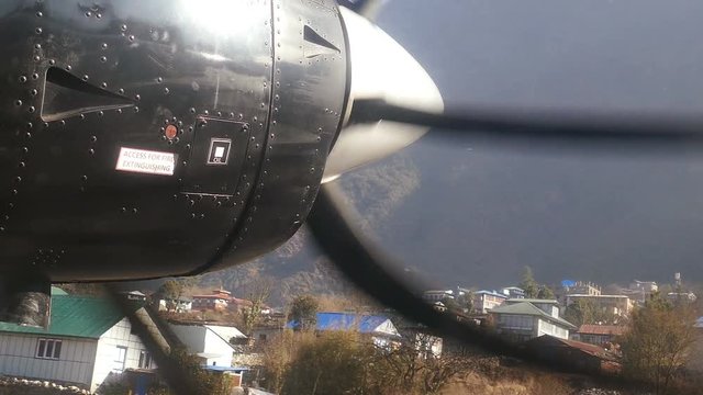 Landing of aircraft at Lukla airport in Nepal, Himalayas.