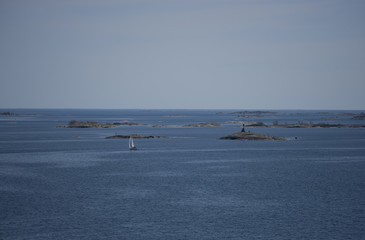 A sailingboat in the outer archipelago of Stockholm a tranquil day in spring
