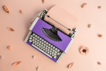 Typing machine on nature background abstract concept.