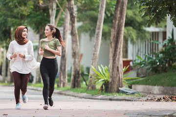 happy young asian woman exercise and warm up