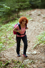 Woman hiking on a trail