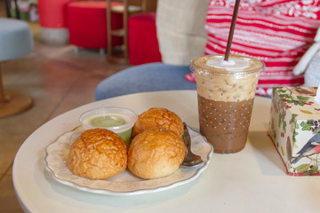 iced coffee  and custard bread