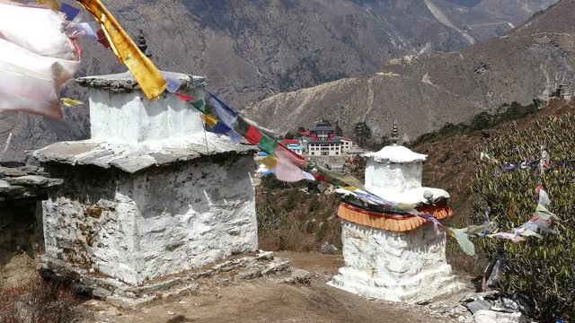 Prayer Stupas and flags on the background of Tengboche Buddhist temple at Solu Khumbu valley, Nepal, Himalayas.