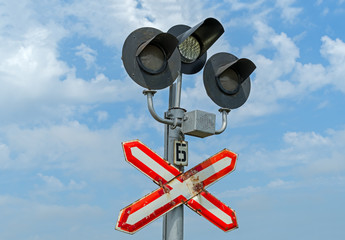 Naklejka na ściany i meble traffic lights at a railway crossing