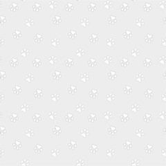 Vector seamless pattern with cat or dog,kitten or puppy footprints. Can be used for wallpaper,fabric, web page background, surface textures.