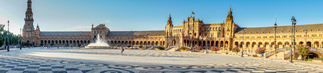 Fototapeta na wymiar Spain, Seville, BUILDINGS IN CITY AGAINST CLEAR SKY in Plaza de Espana, panorama