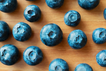 fresh blueberry on a wooden table. bilberry closeup. top view