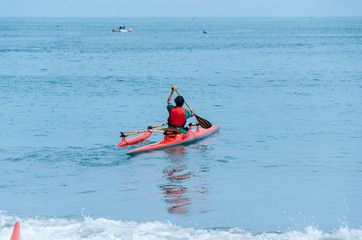 Fototapeta na wymiar Kayaking. Man paddling a kayak.