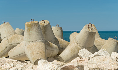 big breakwater on the sea