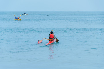 Kayaking. Man paddling a kayak.