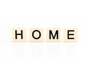 the word HOME on plastic boards isolated on white background with copy space