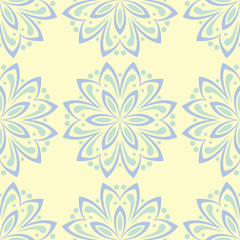 Fototapeta na wymiar Beige colored floral seamless pattern. Background with light blue and green flower elements
