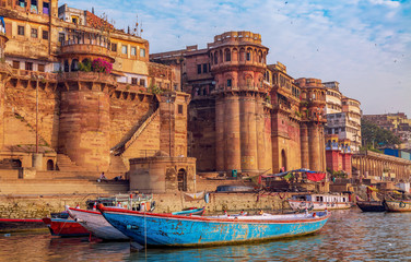 Historic Varanasi city with with ancient architecture along the Ganges river ghat as viewed from a...