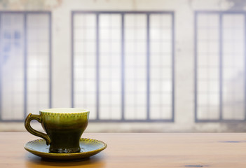 cup on wooden table