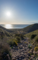 The beach of the dead with the sun and the blue sky