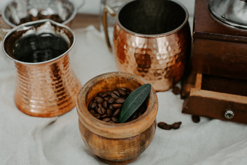  Turkish coffee in traditional embossed metal pot and coffee beens