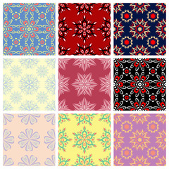 Seamless backgrounds with floral patterns. Colored set.