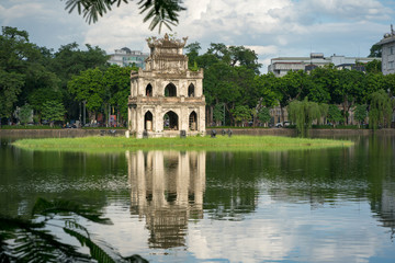 Fototapeta na wymiar Turtle Tower (Thap Rua) in Hoan Kiem lake (Sword lake, Ho Guom) in Hanoi, Vietnam.
