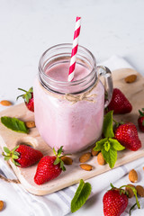 Strawberry milkshake or smoothie.