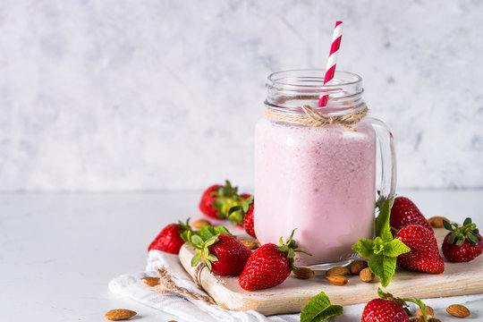 Strawberry milkshake or smoothie.