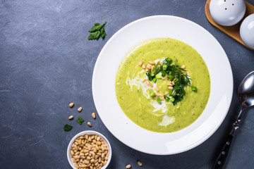 Cream soup with zucchini, herbs and cream.