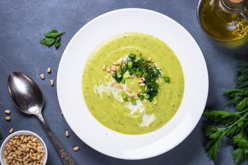 Cream soup with zucchini, herbs and cream.