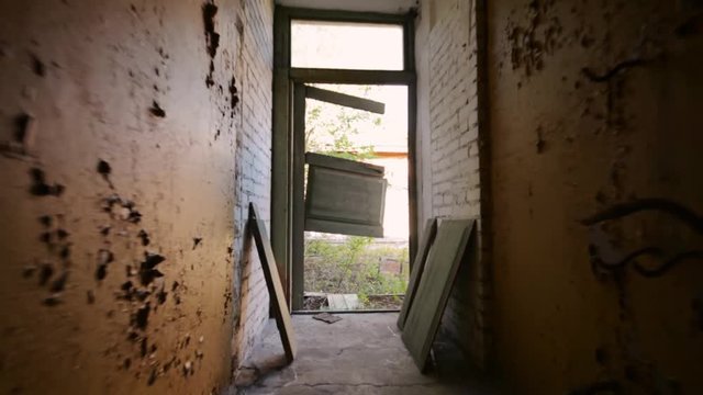 Creepy abandoned farm house building, indoor footage. Steadicam footage. Scary place.