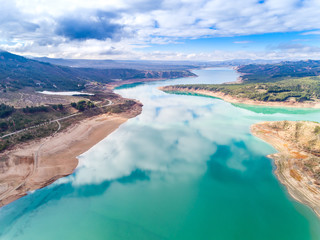 Aerial (drone) view of the "El Negratín" water reservoir, in Baza, Granada province, also known as "the interior sea". This is the third biggest water reservoir in Spain.