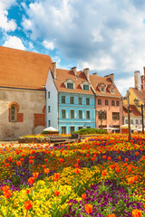 Fototapeta na wymiar Street with old colorful buildings in the Latvian capital Riga in the spring 