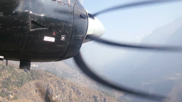Airplane propeller on the backgrond of Solu Khumbu valley, the foot of the Everest peak.