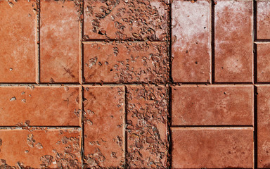 Pavement. Sidewalk tile background. Pavement tile. Top view. Closeup. Old pavement tiles