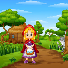 Red hooded girl are in the village at forest