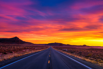 Dramatic sunset over an empty road in Utah - Powered by Adobe