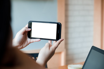 Hand holding mobile phone