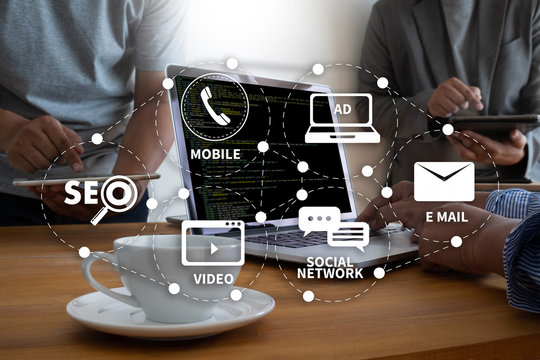 DIGITAL MARKETING new startup project MILLENNIALS Business team hands at work with financial reports and a laptop