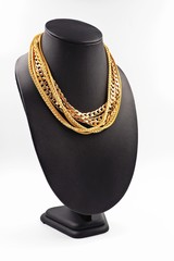 group of gold necklace isolated on white background