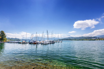 Yacht on a mountain lake in the Swiss Alps