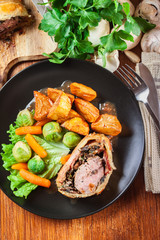 Pork tenderloin in wellington style in puff pastry