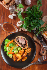 Pork tenderloin in wellington style in puff pastry