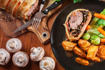 Pork tenderloin in wellington style in puff pastry