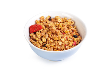 Bowl of homemade granola with fruit pieces isolated on white