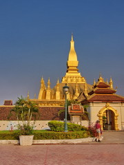 Fototapeta premium Pha That Luang is a gold-covered large Buddhist stupa in the centre of the city of Vientiane, Laos. Travel in 2013, 8th December.