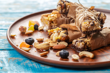 Granola bar on wooden background