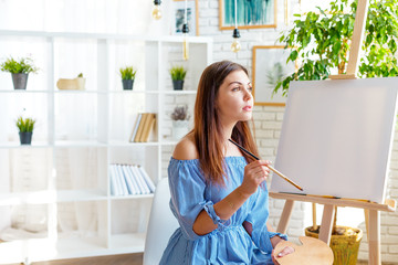 Creative woman working in art studio