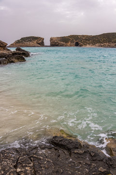 View from Comino to the Island of Cominotto with the crystal Blue Lagoon water