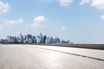 cityscape of modern city from empty asphalt road